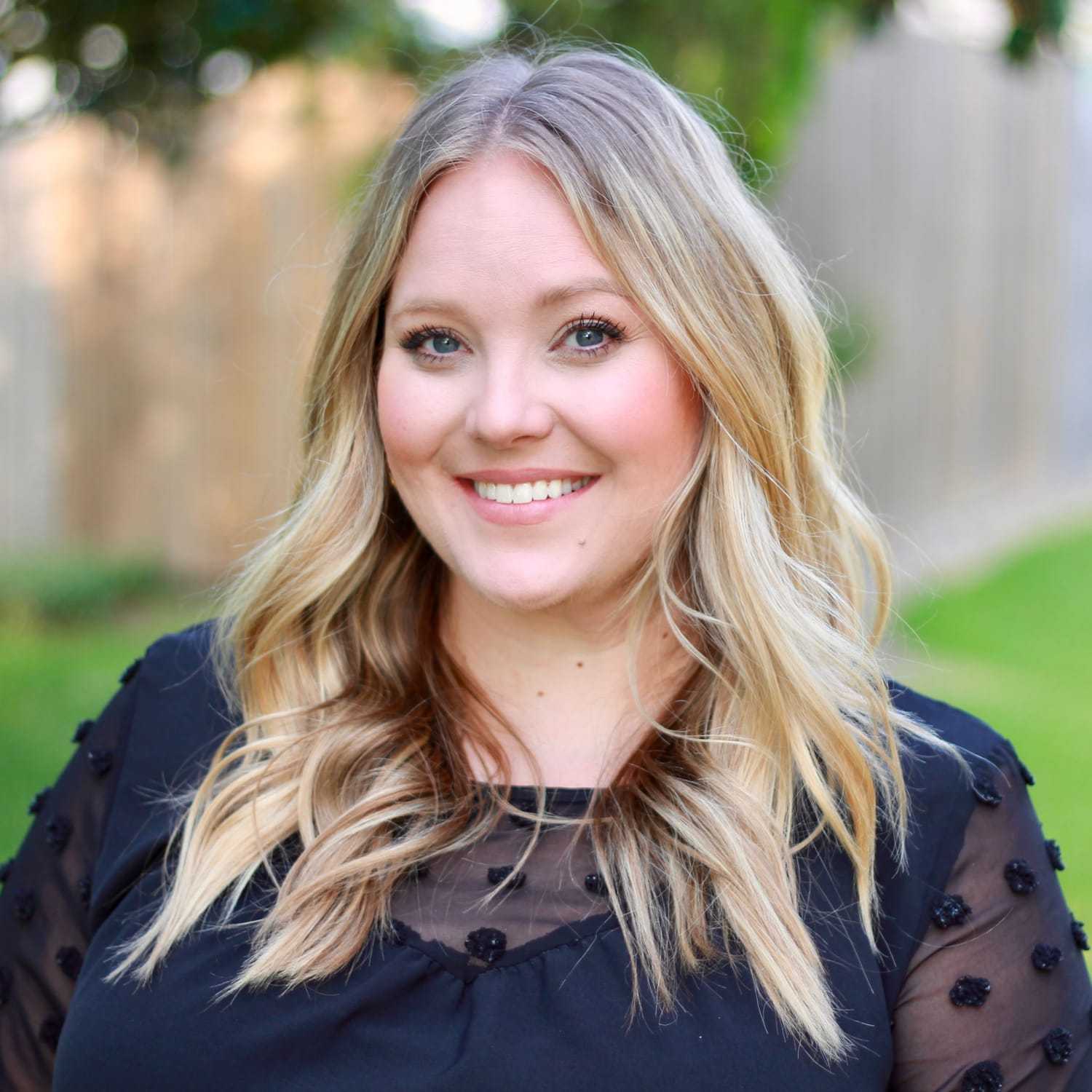 Portrait of Britney, a professional stylist at Scarborough's Salon & Day Spa, showcasing their expertise and style.
